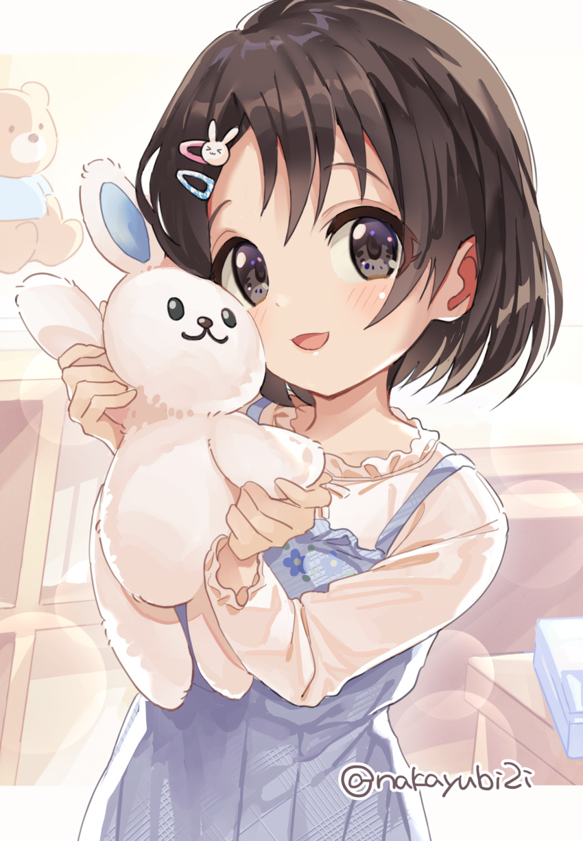 1girl, :o, absurdres, black_hair, blush, bookshelf, bunny_hair_ornament, eyes_visible_through_hair, floral_print, frilled_shirt, frilled_sleeves, frills, hair_ornament, hairclip, hands_up, highres, holding, holding_stuffed_toy, idolmaster, idolmaster_cinderella_girls, kinme, lens_flare, looking_at_viewer, outside_border, sasaki_chie, shirt, short_hair, smile, solo, stuffed_animal, stuffed_bunny, stuffed_toy, teddy_bear, twitter_username, upper_body