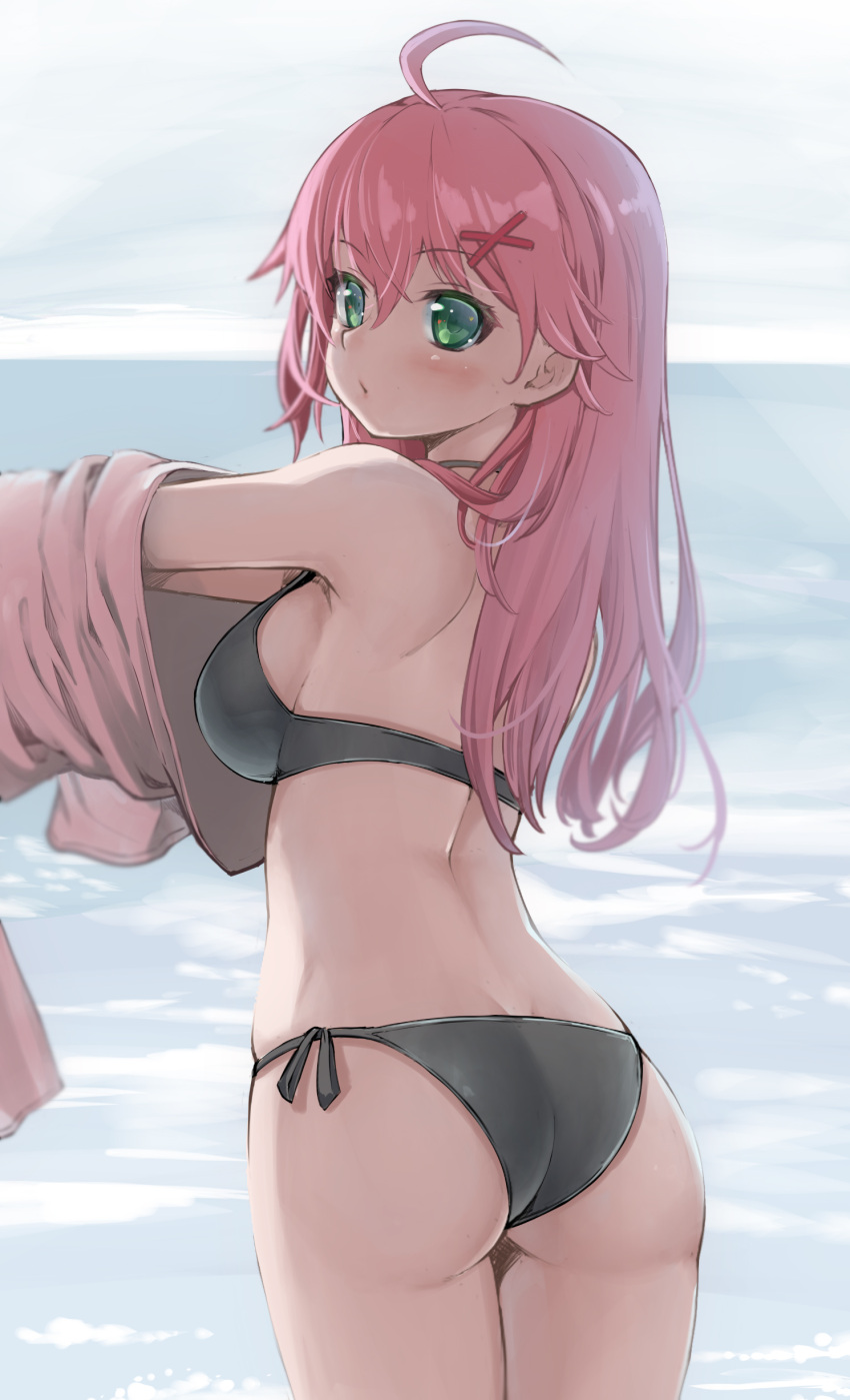 1girl, absurdres, ahoge, ass, back, bangs, bikini, black_bikini, breasts, eyebrows_visible_through_hair, green_eyes, grey_sky, hair_between_eyes, hair_ornament, highres, hololive, horizon, kintarou_(kintarou's_room), looking_at_viewer, medium_breasts, medium_hair, ocean, pink_hair, pink_shirt, sakura_miko, shirt, shoulder_blades, sideboob, solo, standing, swimsuit, swimwear, undressing, x_hair_ornament
