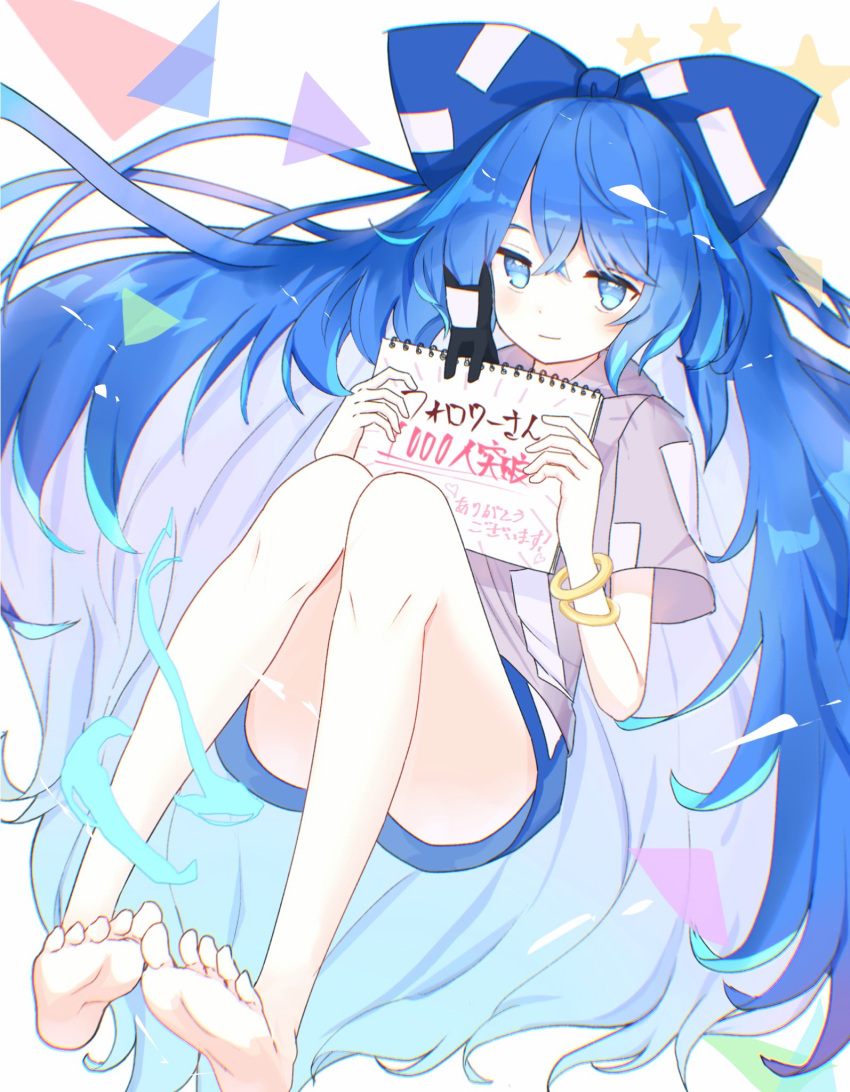 1girl, bangle, bare_legs, barefoot, blue_bow, blue_eyes, blue_hair, blue_skirt, bow, bracelet, feet, grey_hoodie, hair_bow, highres, holding, holding_sign, hood, hoodie, jewelry, long_hair, looking_at_viewer, nyanaya, sign, simple_background, skirt, smile, solo, thighs, touhou, translation_request, triangle, very_long_hair, yorigami_shion