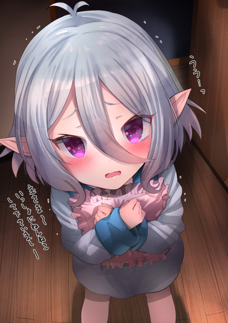 1girl, antenna_hair, bangs, blush, collared_shirt, commentary_request, eyebrows_visible_through_hair, frilled_pillow, frills, grey_hair, grey_shirt, hair_between_eyes, indoors, inuno_pesu, kokkoro_(princess_connect!), long_sleeves, looking_at_viewer, open_mouth, pillow, pillow_hug, pointy_ears, princess_connect!, shirt, sleeves_past_wrists, solo, standing, translation_request, trembling, violet_eyes, wavy_mouth