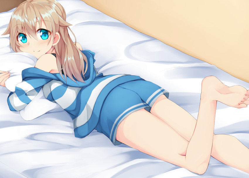 1girl, absurdres, ass, bangs, barefoot, bed, blue_eyes, blue_hoodie, blue_shorts, closed_mouth, commentary, eyebrows_visible_through_hair, highres, hood, hood_down, hoodie, kuzukiri_(riezenagel), leg_up, light_brown_hair, long_hair, looking_at_viewer, looking_back, lying, off_shoulder, on_bed, on_stomach, original, pillow, pillow_hug, ria_(kuzukiri), shirt, short_shorts, shorts, sleepwear, smile, solo, striped, striped_shirt