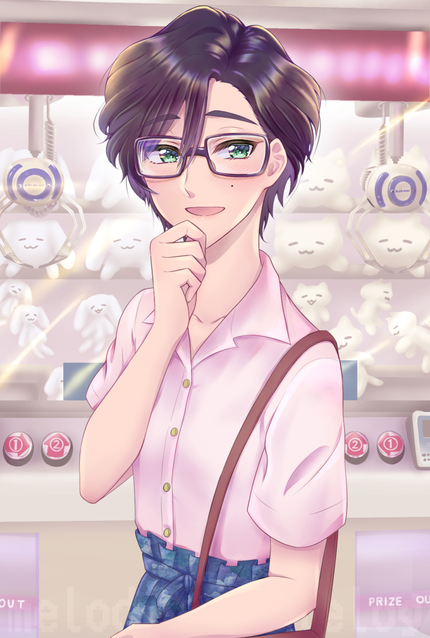 1girl, :d, ai-da-melody, bag, black_hair, blue_skirt, crane_game, glasses, green_eyes, hand_up, handbag, highres, indoors, looking_at_viewer, mole, mole_under_eye, open_mouth, otaku_ni_koi_wa_muzukashii, sakuragi_kou, short_hair, skirt, smile, solo, standing, stuffed_toy