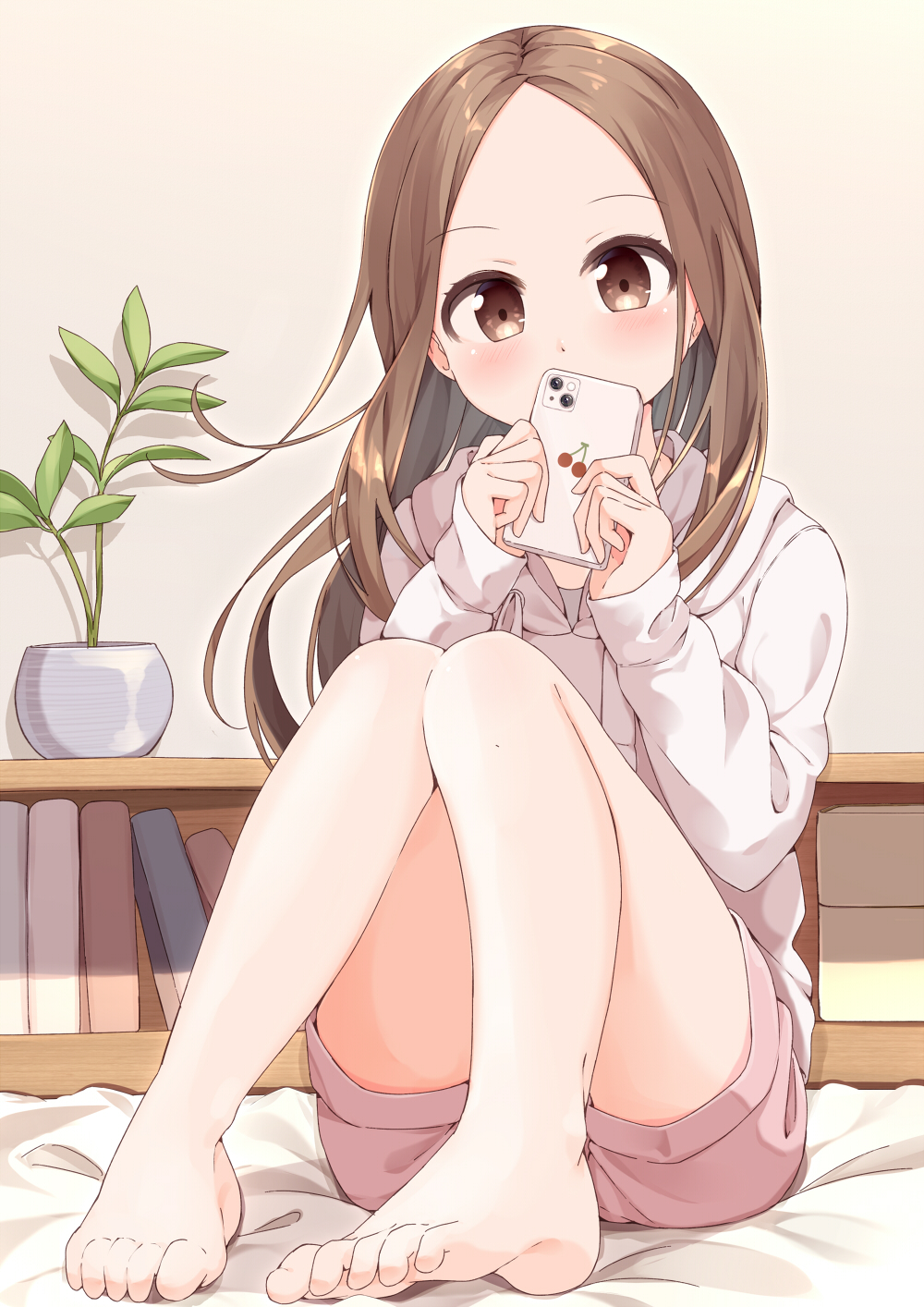 1girl, bangs, barefoot, bed, bedroom, book, bookshelf, brown_eyes, brown_hair, cellphone, cherry_print, feet, food_print, forehead, full_body, highres, holding, holding_phone, indoors, karakai_jouzu_no_takagi-san, knees_up, looking_at_viewer, medium_hair, parted_bangs, phone, pink_shorts, pink_sweater, plant, short_shorts, shorts, sitting, smartphone, solo, sweater, sweatshirt, takagi-san, wari_(nirodo26)