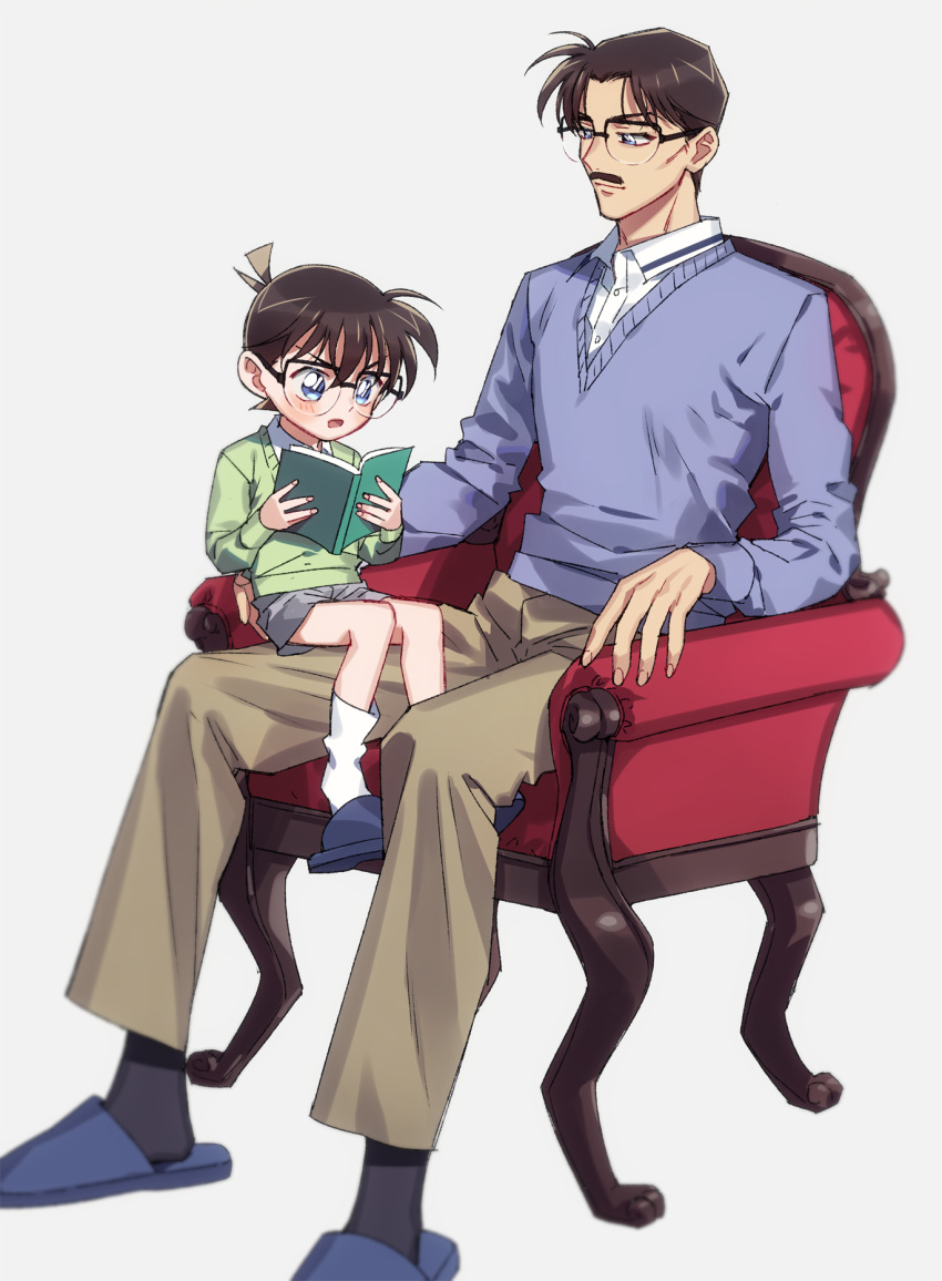 2boys, armchair, bangs, black-framed_eyewear, blue_cardigan, blue_eyes, blue_footwear, blurry