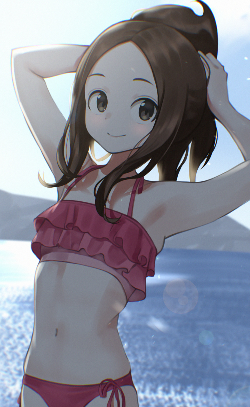 1girl, absurdres, andoplus, armpits, arms_up, bikini, blue_sky, blurry, blurry_background, brown_eyes, brown_hair, closed_mouth, commentary_request, day, flat_chest, frilled_bikini, frills, highres, karakai_jouzu_no_takagi-san, looking_at_viewer, navel, ocean, outdoors, red_bikini, side-tie_bikini, sky, smile, solo, swimsuit, takagi-san