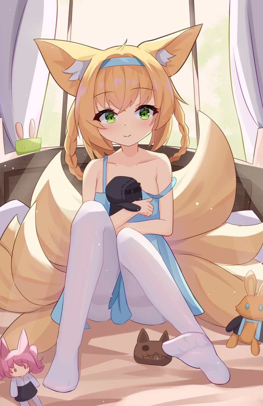 1girl, aaaaabk!, animal_ear_fluff, animal_ears, arknights, bangs, bare_shoulders, bed_frame, blonde_hair, blue_dress, braid, child, closed_mouth, commentary_request, crossed_bangs, curtains, doctor_(arknights), doll, dress, eyebrows_visible_through_hair, fox_ears, full_body, green_eyes, hair_between_eyes, highres, kitsune, knees_together_feet_apart, light_particles, no_shoes, off_shoulder, pantyhose, shamare_(arknights), sitting, smile, soles, solo, stuffed_animal, stuffed_bunny, stuffed_toy, sunlight, suzuran_(arknights), white_legwear, window