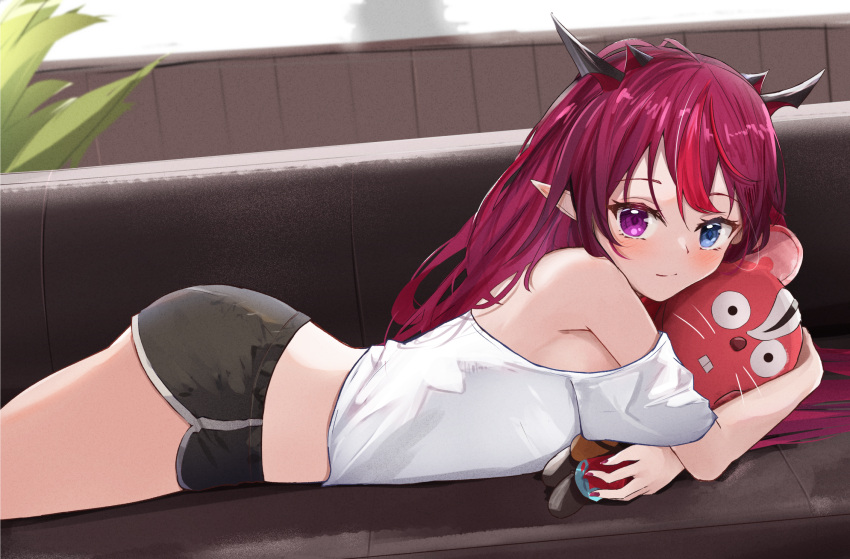1girl, backlighting, bangs, bare_shoulders, black_shorts, blue_eyes, closed_mouth, couch