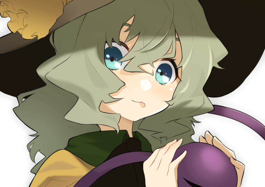 1girl, :p, ascot, black_ascot, black_headwear, blue_eyes, commentary, eyebrows_behind_hair, green_hair, hair_between_eyes, hands_up, hat, hat_ribbon, holding, komeiji_koishi, long_hair, looking_at_viewer, nakano_elsa, portrait, ribbon, shirt, simple_background, solo, third_eye, tongue, tongue_out, touhou, white_background, yellow_ribbon, yellow_shirt