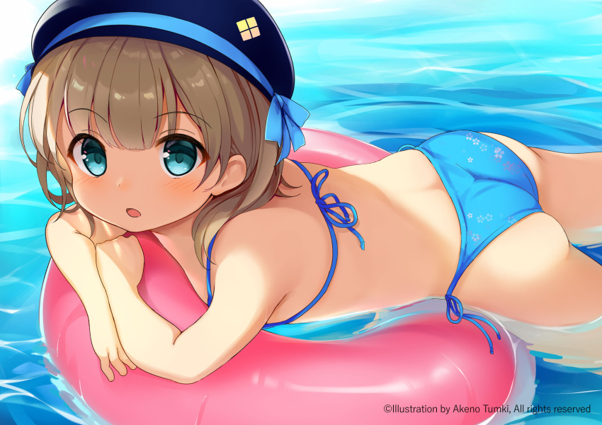 1girl, absurdres, ass, back, bangs, bikini, black_headwear, blue_bikini, blue_eyes, blush, child, commentary_request, day, eyebrows_visible_through_hair, flat_chest, floral_print, hat, highres, innertube, light_brown_hair, looking_at_viewer, lying, on_stomach, open_mouth, original, pink_innertube, ribbed_hat, short_hair, string_bikini, swimsuit, thigh_gap, thighs, tsumiki_akeno, water