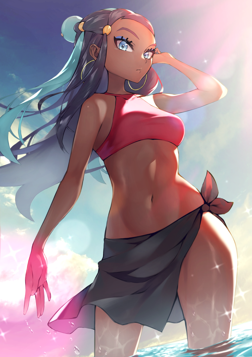 1girl, aqua_hair, bare_arms, black_hair, black_sarong, blue_eyes, blue_eyeshadow, breasts, clouds, commentary_request, dark-skinned_female, dark_skin, day, earrings, eyelashes, eyeshadow, floating_hair, from_below, hair_bun, hand_up, highres, hoop_earrings, jewelry, lens_flare, long_hair, makeup, midriff, multicolored_hair, navel, nessa_(pokemon), outdoors, pokemon, pokemon:_twilight_wings, red_swimsuit, rindoriko, sarong, sky, solo, sparkle, swimsuit, two-tone_hair, wading, water