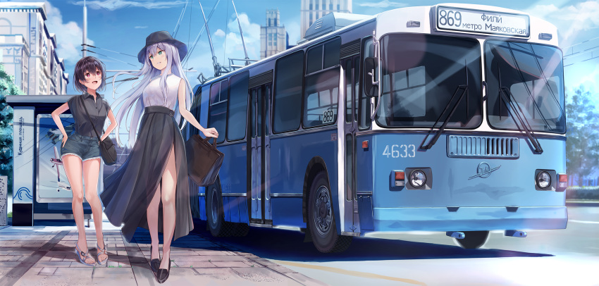 2girls, bag, black_footwear, black_shirt, blue_shorts, blue_sky, brown_hair, building