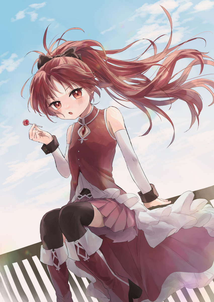 1girl, absurdres, blush, bow, candy, fence, food, full_body, hair_bow, highres, holding, holding_food, lollipop, long_hair, mahou_shoujo_madoka_magica, morisata, open_mouth, ponytail, red_eyes, redhead, ribbon, rooftop, sakura_kyouko, sitting, sitting_on_fence, sky, solo, very_long_hair