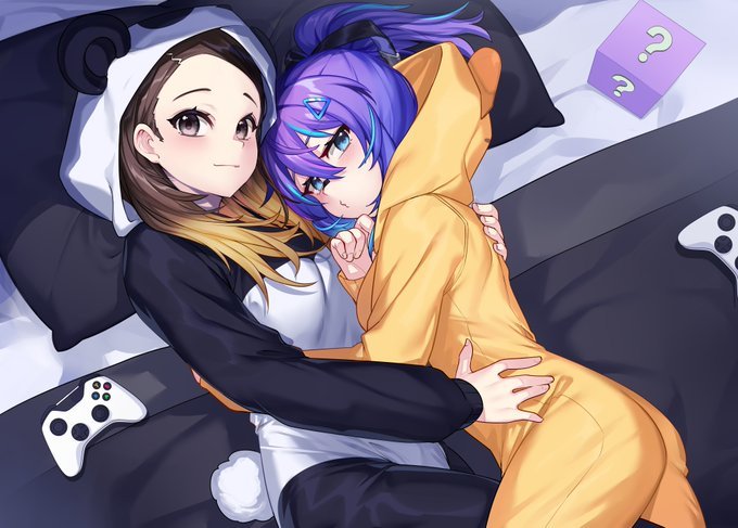 2girls, animal_costume, animal_hood, bed, blonde_hair, blue_eyes, blush, breasts