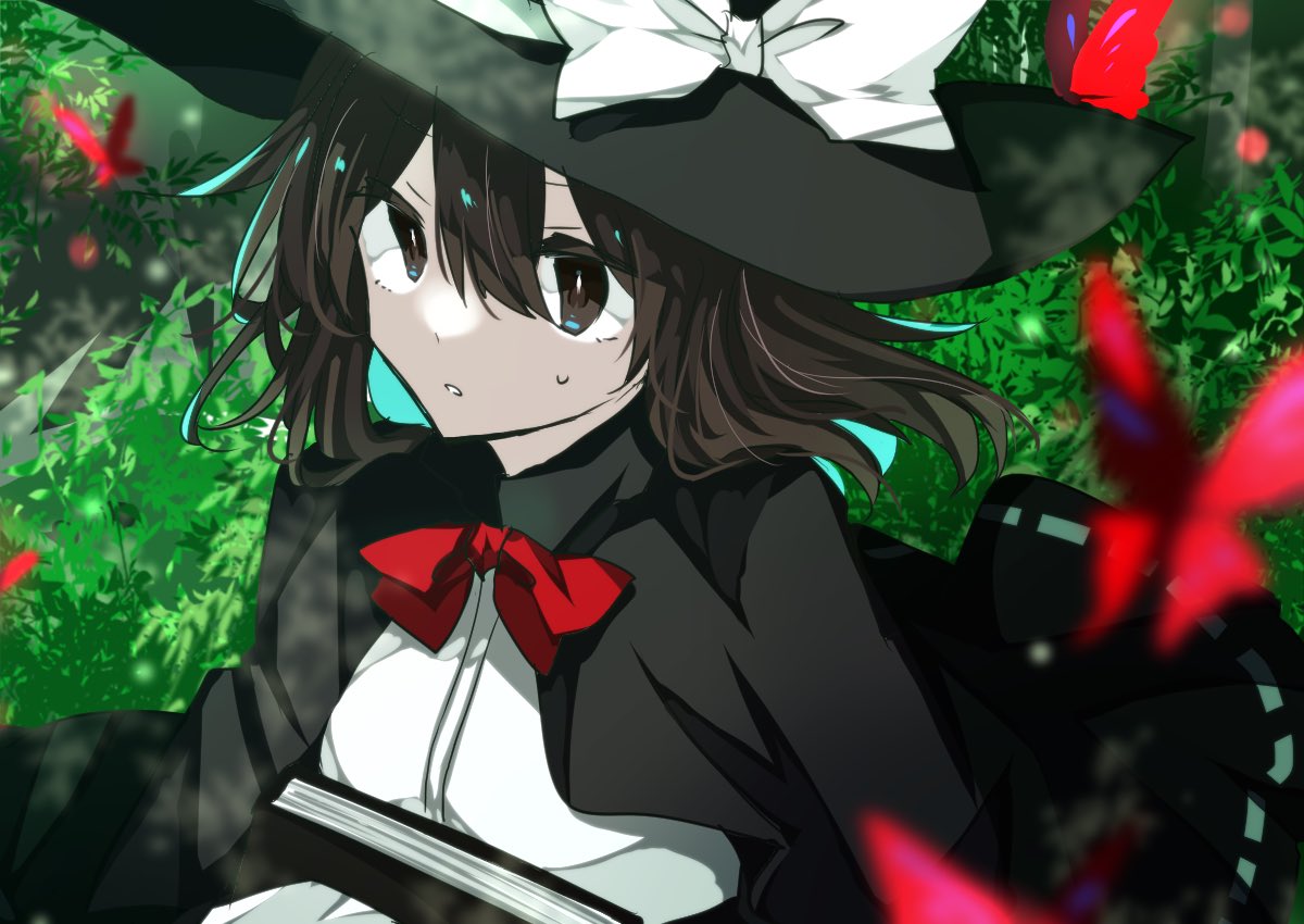 1girl, black_capelet, black_hair, black_headwear, black_skirt, blurry, book, bow