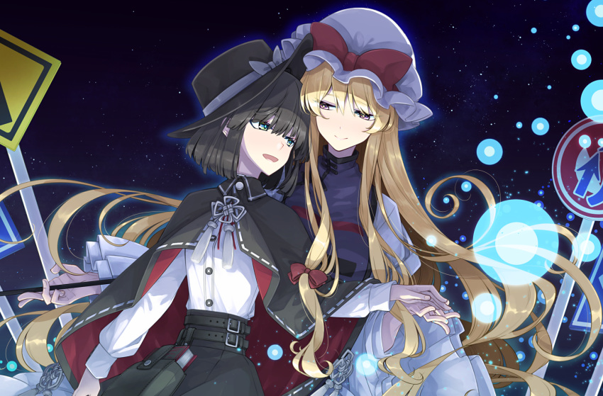 2girls, alternate_eye_color, bangs, black_capelet, black_hair, black_skirt, blonde_hair, blunt_bangs