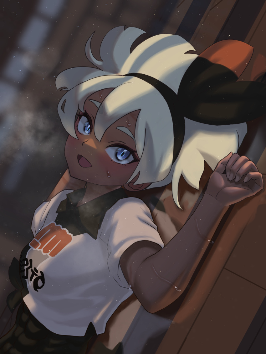 1girl, :d, absurdres, bangs, bea_(pokemon), black_hairband, blonde_hair, blue_eyes, blush, bow_hairband, breath, collared_shirt, commentary_request, dark-skinned_female, dark_skin, dokutsumamuru, eyelashes, hair_between_eyes, hairband, hand_up, highres, looking_at_viewer, lying, on_back, open_mouth, pokemon, pokemon_(game), pokemon_swsh, print_shirt, shirt, short_hair, short_sleeves, smile, solo, sweat, tongue, upper_body, white_shirt