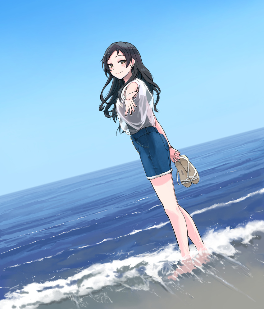 1girl, barefoot, beach, black_hair, black_shirt, blue_sky, blush, denim, denim_shorts, dutch_angle, earrings, epitaph_(1122), foreshortening, highres, horizon, idolmaster, idolmaster_million_live!, jewelry, kitazawa_shiho, long_hair, looking_at_viewer, looking_to_the_side, outdoors, reaching_towards_viewer, see-through, see-through_shirt, shirt, shorts, sky, smile, solo, stud_earrings, very_long_hair, wading