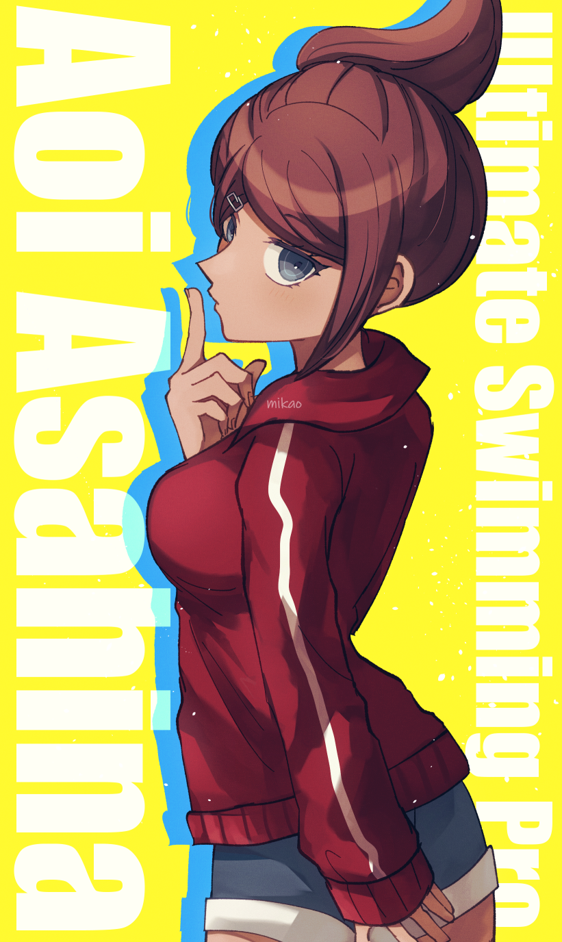 1girl, artist_name, asahina_aoi, bangs, blue_eyes, breasts, brown_hair, danganronpa:_trigger_happy_havoc, danganronpa_(series), dark-skinned_female, dark_skin, from_side, hair_ornament, hand_up, highres, index_finger_raised, jacket, large_breasts, mikao_(eanv5385), red_jacket, short_hair, shorts, sleeves_past_wrists, solo, yellow_background