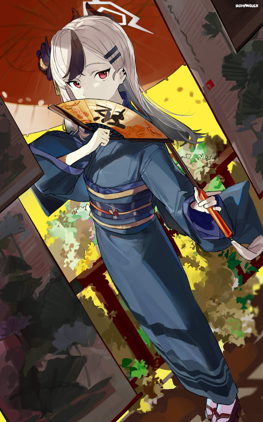 1girl, absurdres, artist_name, black_flower, black_hair, blue_archive, blue_kimono, bush, covering_mouth, demon_horns, earclip, flower, geta, gohanduck, hair_down, hair_flower, hair_ornament, hairclip, halo, hand_fan, hand_fan_writing, hand_up, hanging_scroll, highres, holding, holding_fan, holding_umbrella, horns, japanese_clothes, kayoko_(blue_archive), kayoko_(new_year)_(blue_archive), kimono, long_hair, long_sleeves, looking_at_viewer, looking_to_the_side, multicolored_hair, new_year, obi, obijime, official_alternate_costume, oil-paper_umbrella, pale_skin, railing, red_eyes, sash, scroll, solo, streaked_hair, tabi, umbrella, white_hair, wide_sleeves, yellow_background, yellow_flower
