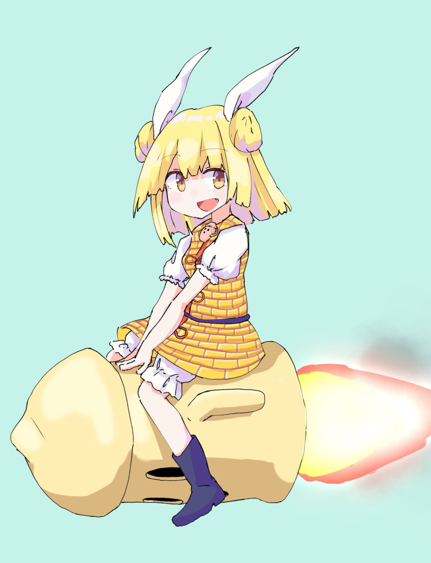 1girl, :d, armor, armored_dress, black_footwear, blonde_hair, blue_background, commentary_request, double_bun, dress, fang, fire, full_body, hair_bun, hair_ribbon, haniwa_(statue), highres, joutouguu_mayumi, kalmia495, looking_at_viewer, open_mouth, ribbon, riding_rocket, short_hair, short_sleeves, simple_background, sitting, smile, solo, touhou, white_ribbon, yellow_dress, yellow_eyes