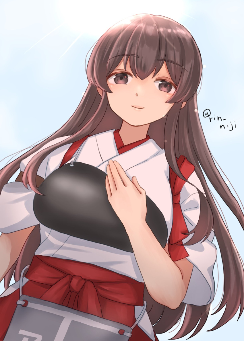 1girl, akagi_(kancolle), brown_eyes, brown_hair, closed_mouth, commentary_request, day, hakama