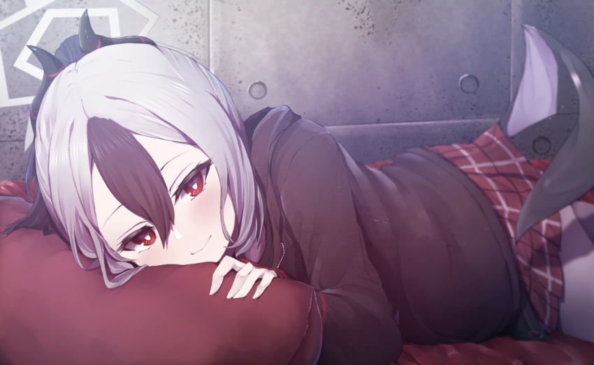 1girl, bed, bed_sheet, bedroom, black_hair, black_jacket, blue_archive, blurry, commentary_request, demon_girl, demon_horns, demon_wings, depth_of_field, hair_between_eyes, halo, head_rest, head_tilt, highres, hood, hooded_jacket, horns, indoors, jacket, kayoko_(blue_archive), long_hair, long_sleeves, looking_at_viewer, lying, multicolored_hair, on_stomach, pillow, plaid, plaid_skirt, pleated_skirt, ponytail, red_eyes, red_skirt, sakishimadara, sidelocks, single_wing, skirt, smile, solo, two-tone_hair, white_hair, wings
