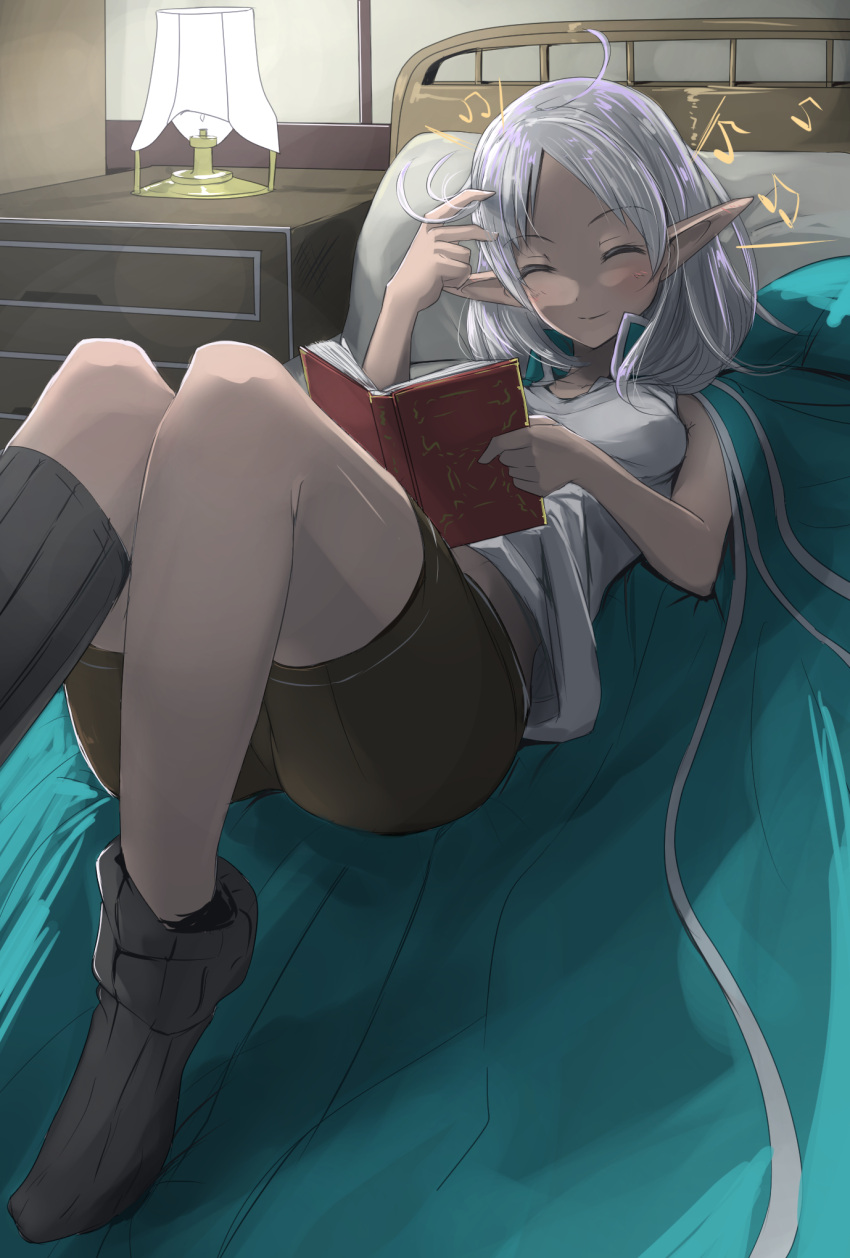 1girl, ahoge, bed, black_socks, book, brown_shorts, closed_eyes, closed_mouth