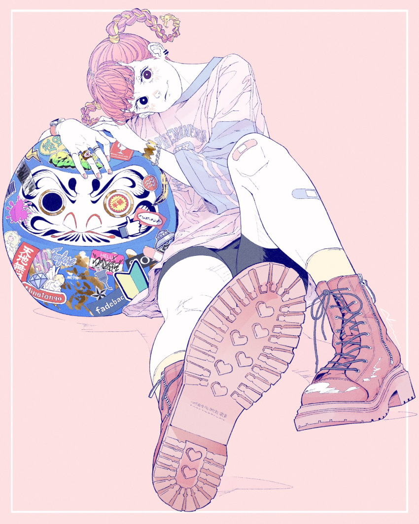 1girl, akira_13go, banana, bandaid, bandaid_on_knee, bandaid_on_leg, barcode, black_eyes, black_shorts, boots, bracelet, braid, bright_pupils, daruma_doll, earrings, food, fruit, highres, jewelry, original, pink_background, pink_footwear, pink_hair, pink_shirt, pink_theme, print_shirt, ring, shirt, shoe_soles, shorts, simple_background, sitting, socks, solo, sticker, twin_braids, white_pupils, yellow_socks
