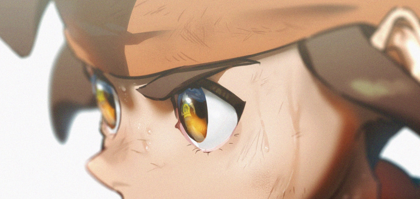 1boy, blurry, brown_hair, close-up, commentary, depth_of_field, endou_mamoru, eye_focus