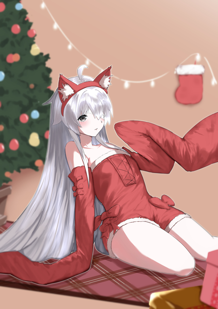 absurdres, ahoge, animal_ear_fluff, animal_ears, bandage_over_one_eye, bare_shoulders, box, christmas, christmas_lights, christmas_ornaments, christmas_tree, dress, fake_animal_ears, fur-trimmed_dress, fur_trim, gift, gift_box, grey_eyes, grey_hair, hair_between_eyes, highres, long_hair, no.21_(punishing:_gray_raven), punishing:_gray_raven, red_dress, santa_costume, sidelocks, sleeves_past_fingers, sleeves_past_wrists, takashi_san, very_long_hair, wolf_ears