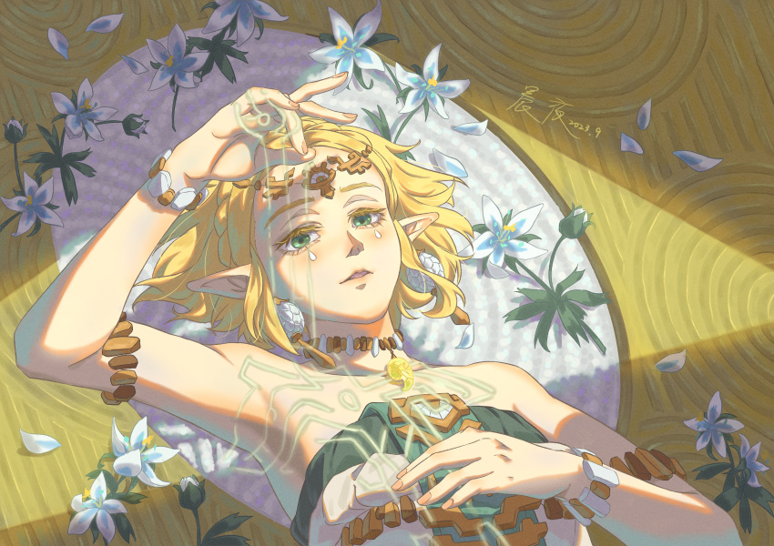 1girl, absurdres, armlet, blush, bracelet, braid, crown_braid, dress, earrings, green_eyes, highres, jewelry, lying, magatama, magatama_necklace, master_sword, necklace, on_back, pointy_ears, princess_zelda, shinnya, short_hair, silent_princess, sleeveless, sleeveless_dress, solo, strapless, strapless_dress, the_legend_of_zelda, the_legend_of_zelda:_tears_of_the_kingdom, white_dress