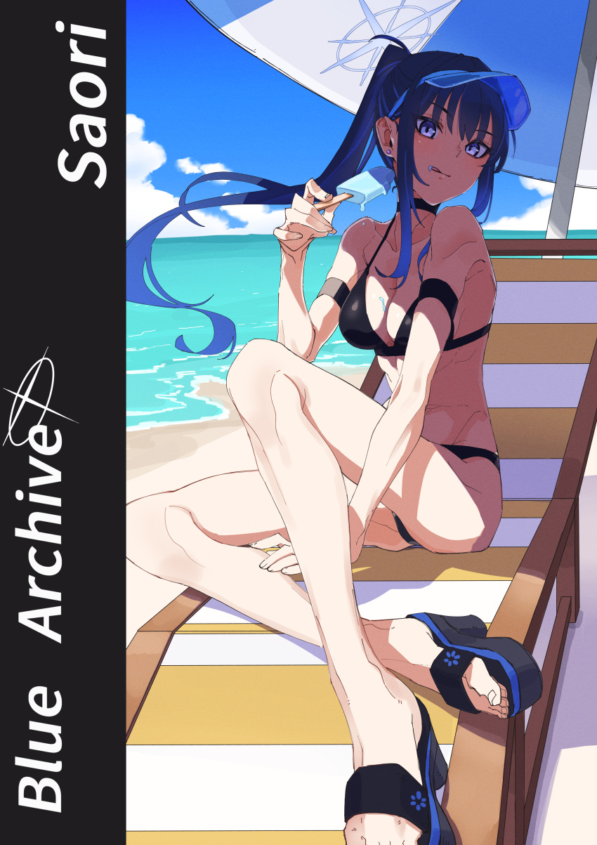 1girl, absurdres, bare_legs, beach, beach_chair, beach_umbrella, bikini, black_bikini, blue_archive, blue_eyes, breasts, choker, day, earrings, eating, food, halo, halterneck, high_heels, high_ponytail, highres, ice_cream, jewelry, long_hair, looking_at_viewer, ocean, outdoors, popsicle, sandals, saori_(blue_archive), shiratama_(siratama5656), solo, stomach, swimsuit, umbrella, visor_cap