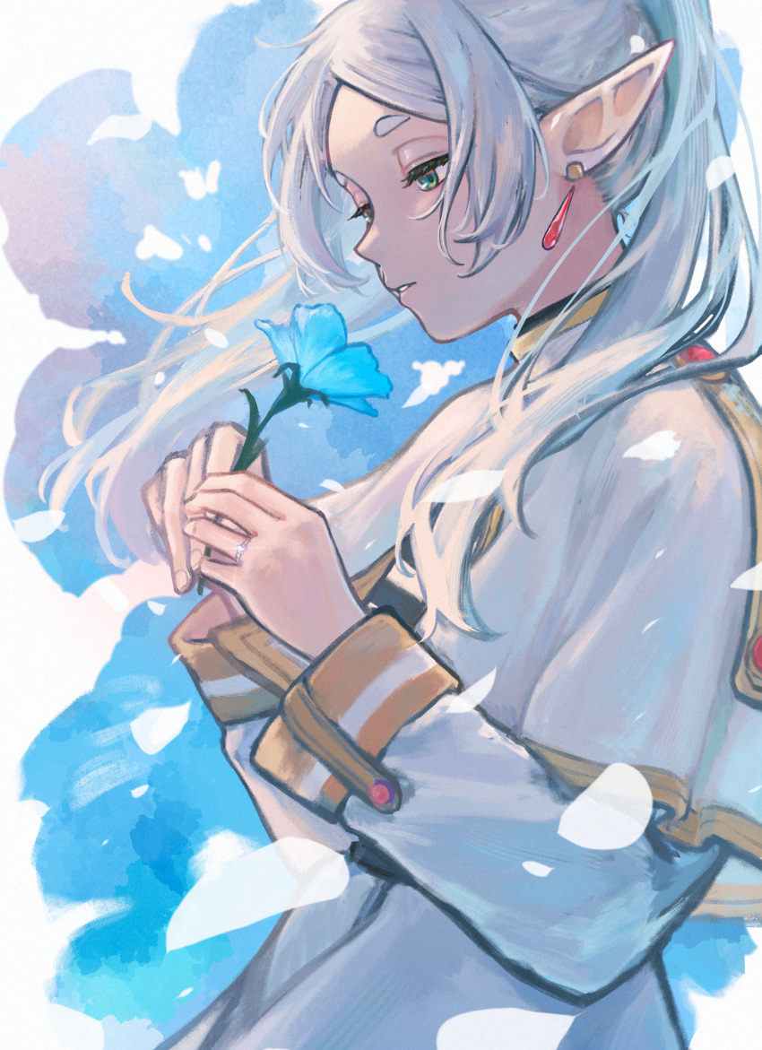 1girl, absurdres, blue_flower, capelet, commentary_request, dress, earrings, elf, floating_hair, flower, frieren, green_eyes, half-closed_eyes, highres, holding, holding_flower, inoryyy000, jewelry, long_hair, long_sleeves, parted_lips, pointy_ears, profile, solo, sousou_no_frieren, twintails, white_capelet, white_dress, white_hair