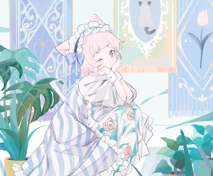 1girl, animal_ears, cat_ears, closed_mouth, commentary, dress, elbows_on_knees, floral_print