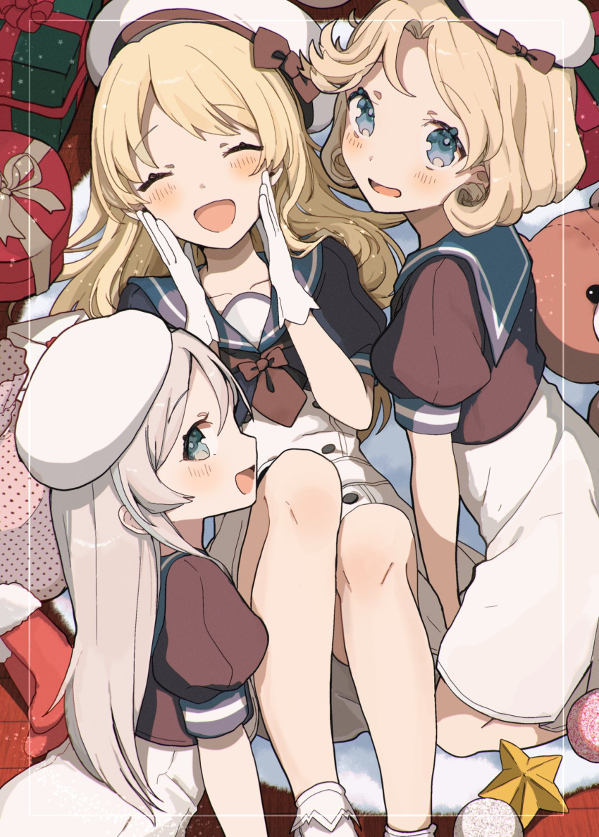 3girls, black_neckerchief, blonde_hair, blue_eyes, blue_sailor_collar, blush, box, christmas, christmas_stocking, closed_eyes, dress, gift, gift_box, gloves, grey_hair, hat, highres, janus_(kancolle), javelin_(kancolle), jervis_(kancolle), kantai_collection, long_hair, multiple_girls, neckerchief, open_mouth, sailor_collar, sailor_dress, shamomo, short_hair, short_sleeves, star_(symbol), stuffed_animal, stuffed_toy, teddy_bear, white_gloves, white_headwear