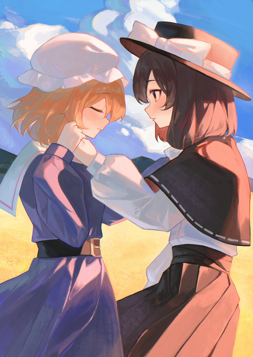 2girls, absurdres, belt_buckle, black_capelet, black_headwear, black_skirt, blonde_hair, blush