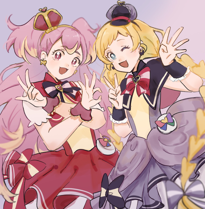 2girls, black_bow, black_capelet, black_headwear, black_wrist_cuffs, blonde_hair, blue_eyes, bow