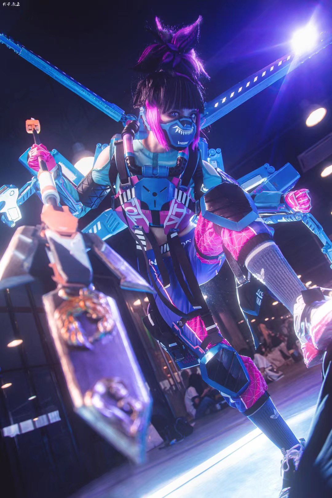 1girl, apex_legends, armor, black_hair, blue_shirt, breastplate, clenched_hand, clothing_cutout