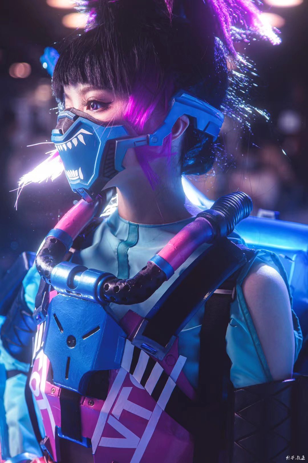 1girl, apex_legends, armor, black_hair, blue_shirt, breastplate, clothing_cutout, cosplay_photo