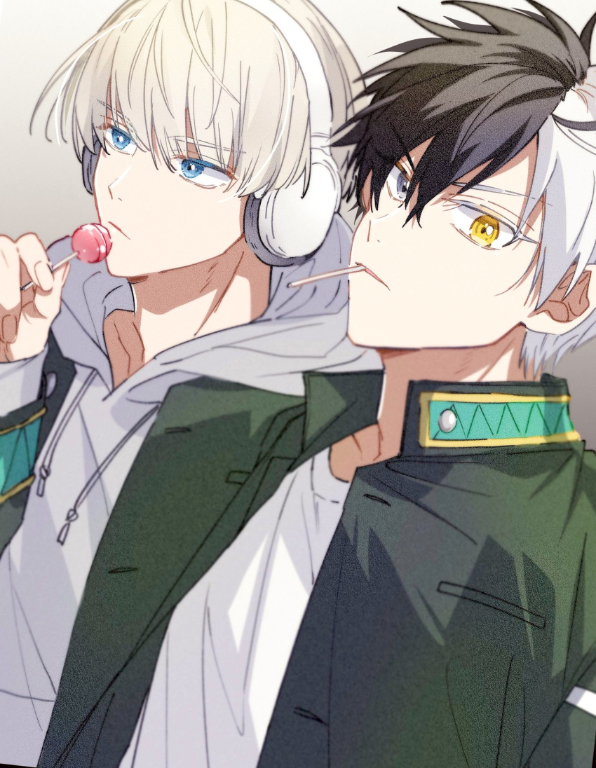 2boys, black_hair, blue_eyes, candy, drawstring, food, headphones, heterochromia
