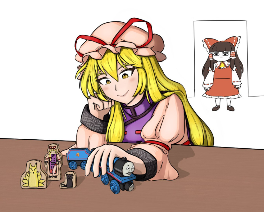 2girls, ascot, blonde_hair, bow, brown_hair, chen, chen_(cat), closed_mouth, femboy_reaper, hair_bow, hair_tubes, hakurei_reimu, hat, hat_ribbon, long_hair, looking_at_another, mob_cap, multiple_girls, pink_hat, red_bow, red_ribbon, ribbon, sidelocks, simple_background, smile, thomas_the_tank_engine, touhou, toy_train, white_background, yakumo_ran, yakumo_ran_(fox), yakumo_yukari, yellow_ascot, yellow_eyes