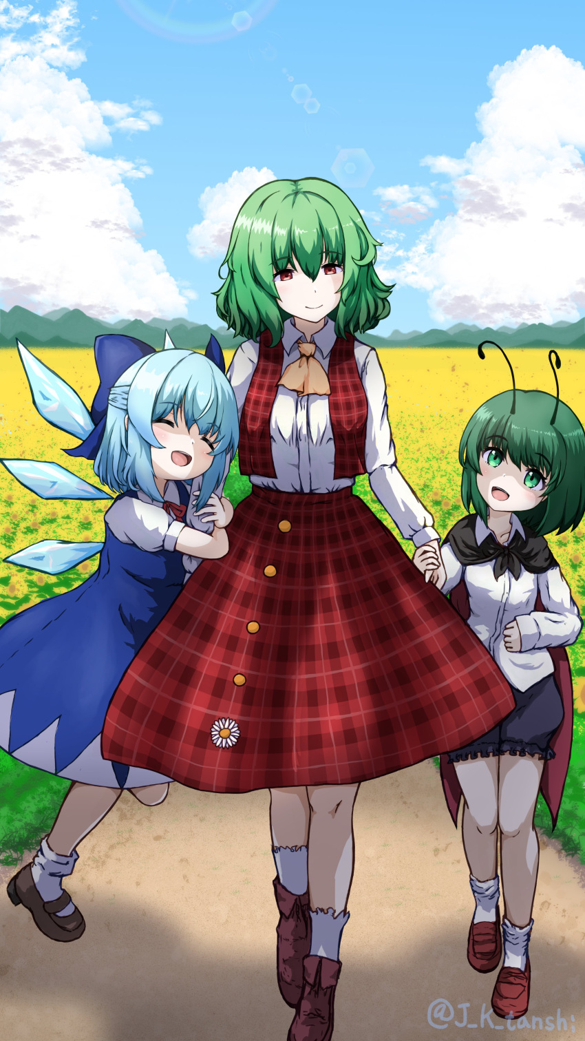 3girls, absurdres, antennae, black_footwear, black_shorts, blue_dress, blue_eyes, blue_hair, blue_sky, brown_footwear, cape, cirno, clouds, collared_shirt, commentary_request, detached_wings, dress, field, flower, flower_field, full_body, green_eyes, green_hair, highres, ice, ice_wings, kazami_yuuka, mountainous_horizon, multiple_girls, outdoors, pengin09rx, plaid_clothes, plaid_skirt, plaid_vest, red_eyes, red_skirt, red_vest, shirt, shoes, short_hair, shorts, skirt, sky, socks, sunflower, sunflower_field, touhou, vest, white_flower, white_shirt, white_socks, wings, wriggle_nightbug