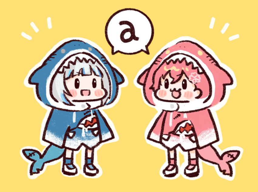 2girls, :3, :d, a_(phrase), animal_hood, blue_hair, blush, chibi, commentary, cosplay, fins, fish_tail, gawr_gura, gawr_gura_(1st_costume), gawr_gura_(cosplay), grey_hair, hair_between_eyes, haseco777, highres, hololive, hololive_english, hood, long_sleeves, looking_at_another, multicolored_hair, multiple_girls, pink_hair, sakura_miko, shark_hood, shark_tail, smile, standing, streaked_hair, tail, virtual_youtuber, yellow_eyes