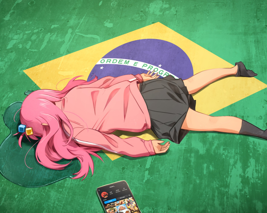 1girl, absurdres, black_socks, bocchi_the_rock!, brazilian_flag, cellphone, cube_hair_ornament, english_commentary, face_down, feet_out_of_frame, gotoh_hitori, grey_skirt, hair_ornament, highres, jacket, khyle., long_hair, long_sleeves, lying, miniskirt, on_stomach, phone, pink_hair, pink_jacket, pleated_skirt, puddle, skirt, smartphone, socks, solo