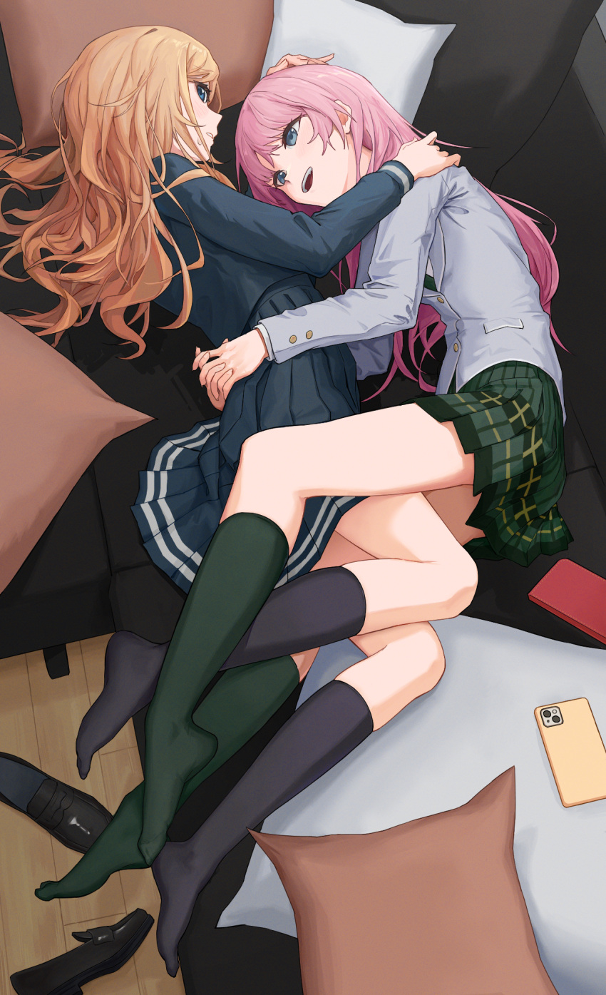 2girls, bang_dream!, bang_dream!_it's_mygo!!!!!, black_footwear, black_socks, blue_eyes, blue_shirt, blue_skirt, brown_hair, cellphone, chihaya_anon, commentary_request, couch, couple, green_necktie, green_skirt, green_socks, grey_jacket, hand_on_another's_head, haneoka_school_uniform, highres, hug, indoors, interlocked_fingers, jacket, kneehighs, loafers, long_hair, long_sleeves, looking_at_another, lying, multiple_girls, nagasaki_soyo, necktie, no_shoes, on_side, open_mouth, own_hands_together, phone, pillow, pink_hair, plaid_clothes, plaid_skirt, pleated_skirt, school_uniform, shirt, shoes, skirt, smartphone, socks, teeth, tsukinomori_school_uniform, unworn_shoes, upper_teeth_only, yao_yang, yuri