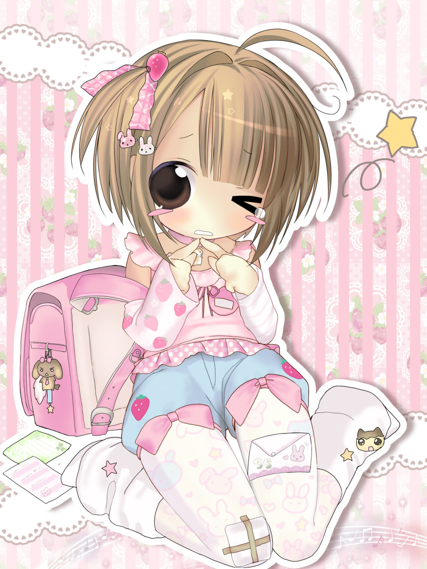 1girl, 2000s_(style), absurdres, ahoge, arm_warmers, backpack, bag, bag_charm, blue_shorts, blush_stickers, bow, brown_eyes, brown_hair, cat, charm_(object), child, choker, commentary, commission, english_commentary, food-themed_hair_ornament, hair_ornament, hair_ribbon, heisei_retro, highres, lace, leggings, looking_at_viewer, loose_socks, musical_note, name_tag, no_shoes, one_eye_closed, original, pink_choker, pink_shirt, rabbit_hair_ornament, randoseru, ribbon, ryuudouji_(p0myu), shirt, short_hair, shorts, sitting, skeb_commission, socks, solo, strawberry_hair_ornament, white_socks