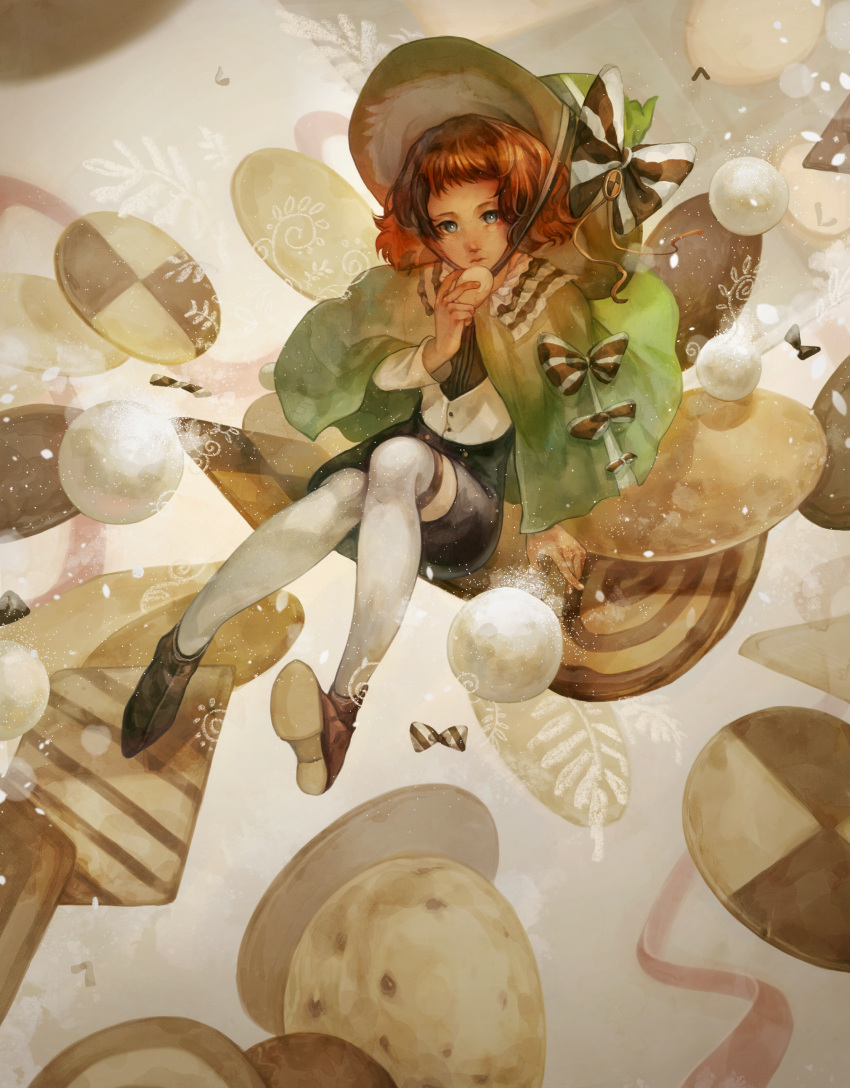1girl, absurdres, black_shorts, bow, brown_hair, capelet, closed_mouth, cookie