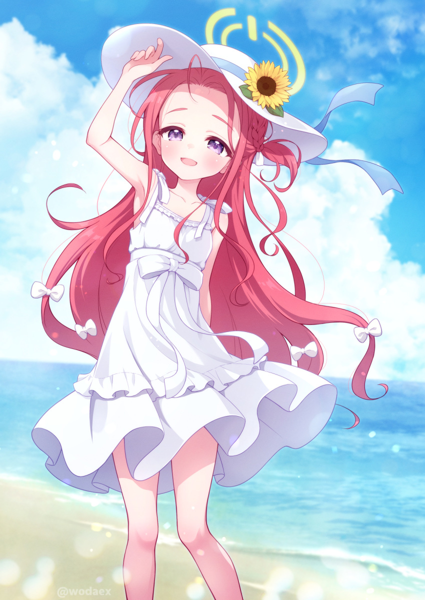 1girl, arm_up, armpits, bare_shoulders, beach, blue_archive, bow, braid, clouds, commentary_request, dress, flower_in_hat, forehead, halo, hat, highres, long_hair, ocean, redhead, single_braid, sky, smile, solo, sun_hat, sundress, twitter_username, violet_eyes, water, wavy_hair, white_bow, white_dress, white_hat, wodaex, yellow_halo, yuzu_(blue_archive)