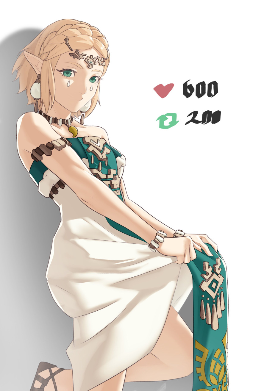 1girl, absurdres, against_wall, armband, bare_arms, bare_shoulders, blonde_hair, braid, breasts, clothes_lift, collarbone, dress, dress_lift, earrings, green_eyes, highres, jewelry, leg_up, lifting_own_clothes, looking_at_viewer, medium_breasts, meme, necklace, pelvic_curtain, pelvic_curtain_lift, pointy_ears, pomelomelon, princess_zelda, secret_stone, short_hair, solo, standing, strapless, strapless_dress, the_legend_of_zelda, the_legend_of_zelda:_tears_of_the_kingdom, twitter_strip_game_(meme), white_background