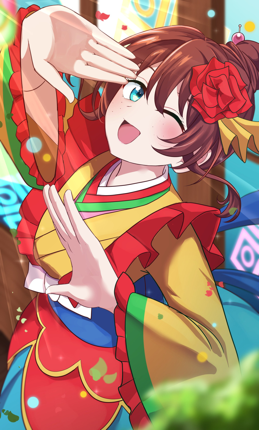 1girl, ;d, absurdres, arm_up, blue_eyes, brown_hair, cara_tesoro, commentary_request, cowboy_shot, emma_verde, flower, freckles, frilled_sleeves, frills, hair_bun, hair_flower, hair_ornament, highres, hiiragi_(hi_ragi1250), japanese_clothes, kimono, long_sleeves, looking_at_viewer, love_live!, love_live!_nijigasaki_high_school_idol_club, love_live!_nijigasaki_high_school_idol_club_kanketsu-hen, one_eye_closed, open_mouth, red_flower, red_skirt, short_hair, short_hair_with_long_locks, sidelocks, single_hair_bun, skirt, smile, solo, wide_sleeves, yellow_kimono